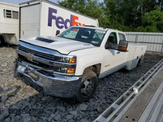 2018 Chevrolet Silverado 3500HD Work Truck with VIN 1GB4KYCY6JF124885, listed as a Copart auction lot 61154445 with 115,687 mi miles and Salvage title. Bid and sale history available at DreamBid. Image 1.