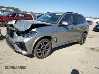 2021 BMW X5 M with VIN 5YMJU0C06M9H49885, listed as a Copart auction lot 88343155 with 15,552 mi miles and Salvage Title. Bid and sale history available at carsss.com. Image 1.