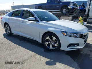 2018 Honda Accord EX-L z VIN 1HGCV1F52JA083242, wystawiony jako IAAI lot #41544446 z przebiegiem 22 387 mil mil oraz . Historia ofert i sprzedaży dostępna na DreamBid. Obrazek 1.