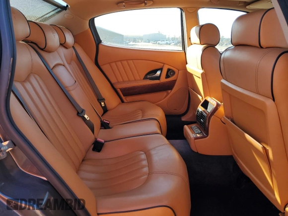2006 Maserati Quattroporte z VIN ZAMCE39A860026491, wystawiony jako Copart lot #43785435 z przebiegiem 65 168 mil mil oraz Czysty tytuł • Clean title. Historia ofert i sprzedaży dostępna na DreamBid. Obrazek 11.