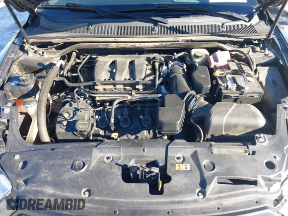 2015 Ford Taurus Limited with VIN 1FAHP2J85FG165823, listed as a IAAI auction lot 41315889 with 134,165 mi miles. Bid and sale history available at carsss.com. Image 10.