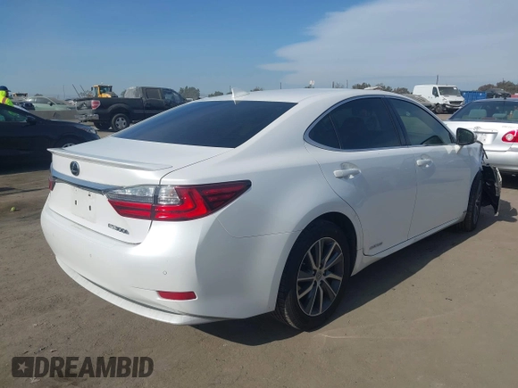 2016 Lexus ES 300h with VIN JTHBW1GGXG2113791, listed as a IAAI auction lot 41116740 with 188,974 mi miles and . Bid and sale history available at DreamBid. Image 4.