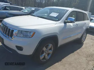 2011 Jeep Grand Cherokee Overland Summit with VIN 1J4RR6GT9BC546825, listed as a IAAI auction lot 42118789 with 123,449 mi miles. Bid and sale history available at carsss.com. Image 2.