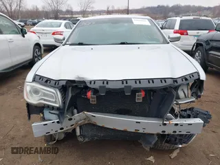 2012 Chrysler 300 C with VIN 2C3CCAKT0CH289662, listed as a IAAI auction lot 42016626 with 195,785 mi miles and . Bid and sale history available at DreamBid. Image 12.