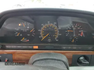 1990 Mercedes-Benz 300 with VIN WDBCA25D9LA550909, listed as a Copart auction lot 82717124 with 221,701 mi miles and Salvage Title. Bid and sale history available at DreamBid. Image 9.