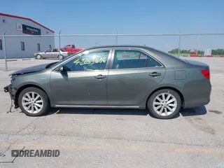 2012 Toyota Camry XLE z VIN 4T1BD1FK7CU037762, wystawiony jako IAAI lot #42253606 z przebiegiem 130 888 mil mil oraz . Historia ofert i sprzedaży dostępna na DreamBid. Obrazek 15.