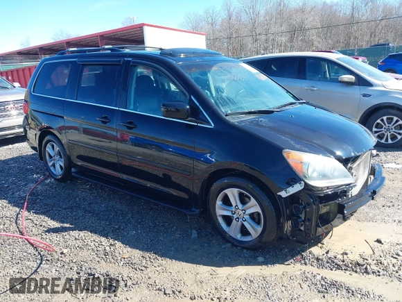 2008 Honda Odyssey Touring with VIN 5FNRL38948B029193, listed as a IAAI auction lot 41618424 with 219,964 mi miles. Bid and sale history available at carsss.com. Image 1.