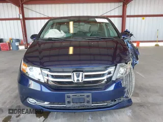 2017 Honda Odyssey Touring with VIN 5FNRL5H90HB017215, listed as a IAAI auction lot 42574528 with 61,386 mi miles and . Bid and sale history available at DreamBid. Image 12.