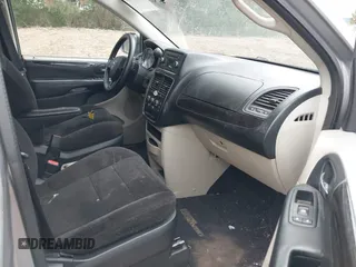 2014 Dodge Grand Caravan American Value with VIN 2C4RDGBG0ER168085, listed as a IAAI auction lot 42020959 with 213,383 mi miles and . Bid and sale history available at DreamBid. Image 5.