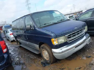 2002 Ford Econoline Passenger XL with VIN 1FMRE11L02HB30156, listed as a IAAI auction lot 41471468 with 128,320 mi miles and . Bid and sale history available at carsss.com. Image 1.