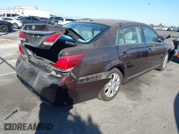 2011 Toyota Avalon with VIN 4T1BK3DB2BU420950, listed as a IAAI auction lot 41331545 with 86,908 mi miles and . Bid and sale history available at DreamBid. Image 4.