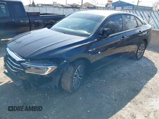 2019 Volkswagen Jetta SEL z VIN 3VWE57BU9KM064213, wystawiony jako IAAI lot #41916005 z przebiegiem 50 719 mil mil oraz . Historia ofert i sprzedaży dostępna na DreamBid. Obrazek 17.