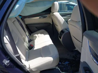 2017 Cadillac XT5 Luxury FWD with VIN 1GYKNBRS2HZ134259, listed as a IAAI auction lot 39416446 with 87,917 mi miles. Bid and sale history available at carsss.com. Image 8.