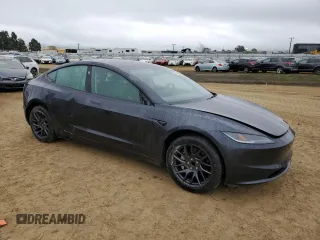 2025 Tesla Model 3 Long Range with VIN 5YJ3E1EA8SF920713, listed as a Copart auction lot 45182445 with 517 mi miles and Salvage title. Bid and sale history available at DreamBid. Image 4.