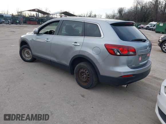 2013 Mazda CX-9 Grand Touring z VIN JM3TB3DV1D0401102, wystawiony jako IAAI lot #41248346 z przebiegiem 122 555 mil mil oraz . Historia ofert i sprzedaży dostępna na DreamBid. Obrazek 3.