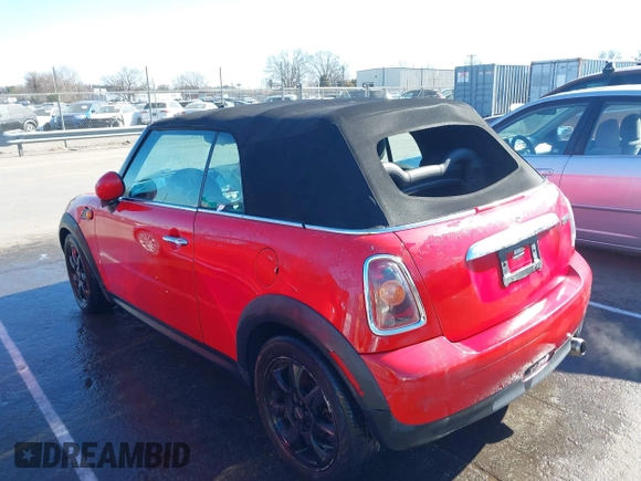 2009 MINI Convertible with VIN WMWMR33569TU95961, listed as a IAAI auction lot 41689845 with 107,934 mi miles and . Bid and sale history available at DreamBid. Image 3.