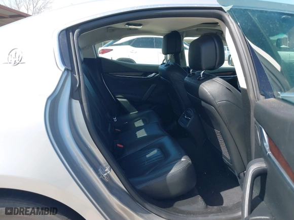 2014 Maserati Ghibli S Q4 with VIN ZAM57RTA8E1085631, listed as a IAAI auction lot 41829745 with 80,418 mi miles. Bid and sale history available at carsss.com. Image 8.