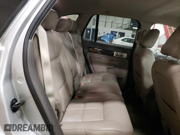 2009 Lincoln MKX with VIN 2LMDU68C69BJ09162, listed as a Copart auction lot 89259625 with 124,908 mi miles and Salvage Title. Bid and sale history available at DreamBid. Image 11.