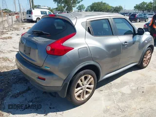 2014 Nissan Juke S with VIN JN8AF5MRXET353882, listed as a IAAI auction lot 42041965 with 239,606 mi miles. Bid and sale history available at carsss.com. Image 4.