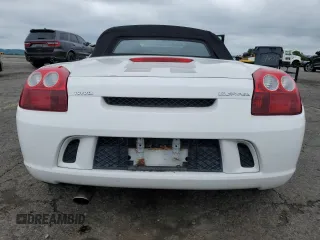 2003 Toyota MR2 z VIN JTDFR320130054491, wystawiony jako Copart lot #58899155 z przebiegiem 62 552 mil mil oraz Szkoda całkowita • Salvage title. Historia ofert i sprzedaży dostępna na DreamBid. Obrazek 6.
