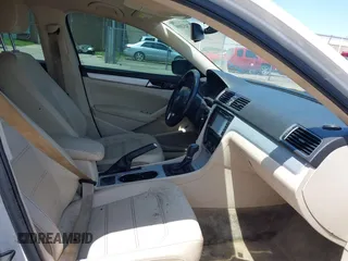 2013 Volkswagen Passat SE with VIN 1VWBP7A32DC007863, listed as a IAAI auction lot 42452096 with 207,083 mi miles and . Bid and sale history available at DreamBid. Image 5.