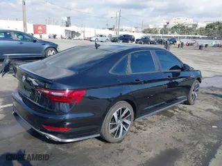 2021 Volkswagen Jetta GLI S with VIN 3VW6T7BU7MM002015, listed as a IAAI auction lot 41349898 with 44,416 mi miles. Bid and sale history available at carsss.com. Image 4.