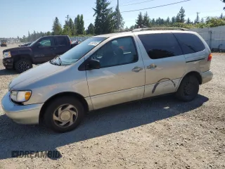 2000 Toyota Sienna LE with VIN 4T3ZF13C0YU290474, listed as a Copart auction lot 63682985 with 177,652 mi miles and Salvage title. Bid and sale history available at DreamBid. Image 1.