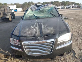 2014 Chrysler 300 with VIN 2C3CCAEGXEH120136, listed as a IAAI auction lot 41020040 with 125,887 mi miles. Bid and sale history available at carsss.com. Image 12.