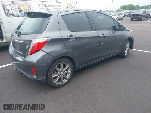 2014 Toyota Yaris L with VIN JTDKTUD38ED594008, listed as a IAAI auction lot 42114950 with 167,597 mi miles and . Bid and sale history available at DreamBid. Image 4.