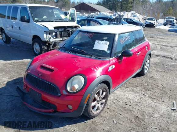 2009 MINI Hardtop S with VIN WMWMF73589TT95974, listed as a IAAI auction lot 41617775 with Not provided miles and . Bid and sale history available at DreamBid. Image 2.