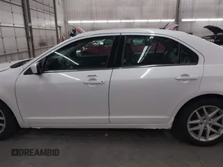 2012 Ford Fusion SEL z VIN 3FAHP0JAXCR104902, wystawiony jako IAAI lot #42471136 z przebiegiem 186 468 mil mil oraz . Historia ofert i sprzedaży dostępna na DreamBid. Obrazek 14.