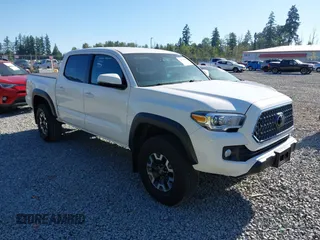 2019 Toyota Tacoma SR with VIN 3TMCZ5AN8KM223591, listed as a IAAI auction lot 42733042 with 70,757 mi miles and . Bid and sale history available at DreamBid. Image 1.