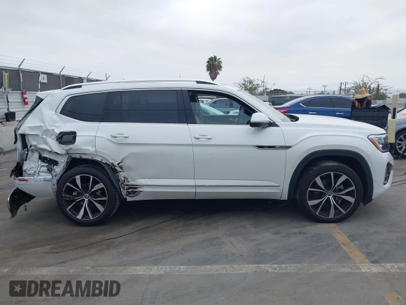 2024 Volkswagen Atlas SEL Premium R-Line with VIN 1V2FR2CA7RC543176, listed as a IAAI auction lot 42358945 with 7,066 mi miles and . Bid and sale history available at DreamBid. Image 13.