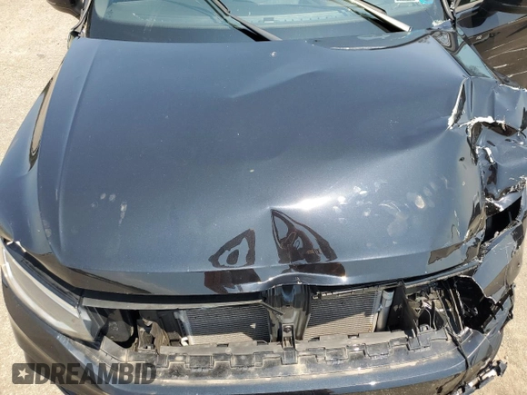2023 Volkswagen Tiguan SE R-Line Black with VIN 3VV8B7AX3PM141106, listed as a Copart auction lot 62381835 with 18,153 mi miles and Salvage title. Bid and sale history available at DreamBid. Image 12.