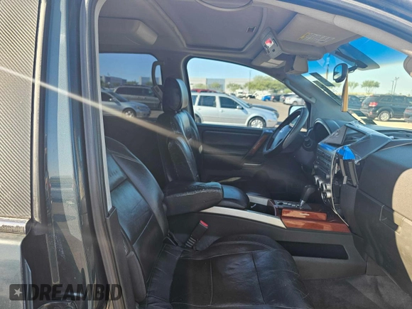 2004 Infiniti QX56 with VIN 5N3AA08A64N812493, listed as a Copart auction lot 77486754 with 0 mi miles and Salvage Title. Bid and sale history available at carsss.com. Image 5.