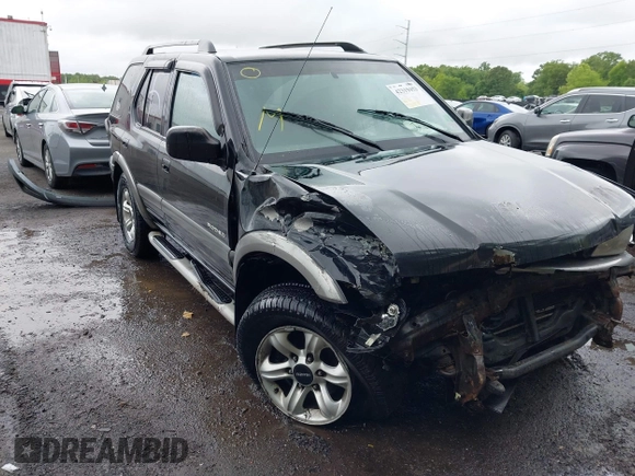 2003 Isuzu Rodeo with VIN 4S2DM58W234312253, listed as a IAAI auction lot 42319453 with 187,939 mi miles and . Bid and sale history available at DreamBid. Image 6.
