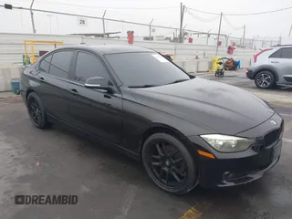 2014 BMW 3 Series 320i with VIN WBA3B1C59EK130839, listed as a IAAI auction lot 41225364 with 131,312 mi miles. Bid and sale history available at carsss.com. Image 1.
