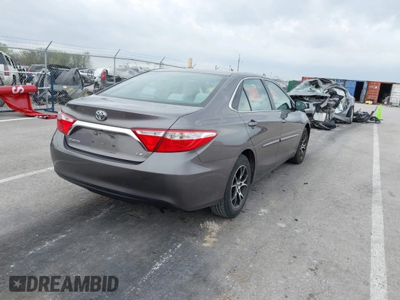 2015 Toyota Camry XLE with VIN 4T4BF1FK5FR483736, listed as a IAAI auction lot 41933106 with 104,468 mi miles. Bid and sale history available at carsss.com. Image 4.