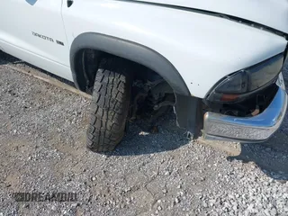 2000 Dodge Dakota z VIN 1B7GL22X1YS740359, wystawiony jako IAAI lot #42430964 z przebiegiem 213 435 mil mil oraz . Historia ofert i sprzedaży dostępna na DreamBid. Obrazek 12.