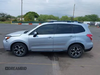 2016 Subaru Forester XT Touring with VIN JF2SJGXC7GH491999, listed as a IAAI auction lot 41907092 with 104,923 mi miles and . Bid and sale history available at DreamBid. Image 14.