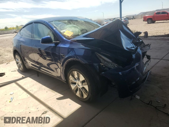 2023 Tesla Model Y Long Range with VIN 7SAYGDEE7PA112865, listed as a Copart auction lot 54626685 with 10,720 mi miles and Salvage Title. Bid and sale history available at DreamBid. Image 4.