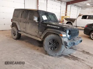 2020 Jeep Wrangler Unlimited Sport Altitude with VIN 1C4HJXDG4LW120627, listed as a IAAI auction lot 41728593 with 63,565 mi miles and . Bid and sale history available at DreamBid. Image 1.
