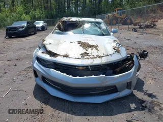 2018 Chevrolet Camaro 1LT z VIN 1G1FB1RS9J0111669, wystawiony jako IAAI lot #41898160 z przebiegiem Nie podano mil oraz . Historia ofert i sprzedaży dostępna na DreamBid. Obrazek 6.