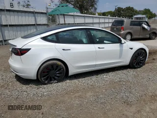 2023 Tesla Model 3 Performance with VIN 5YJ3E1EC5PF487845, listed as a Copart auction lot 62686164 with 4,938 mi miles and Salvage Title. Bid and sale history available at carsss.com. Image 3.