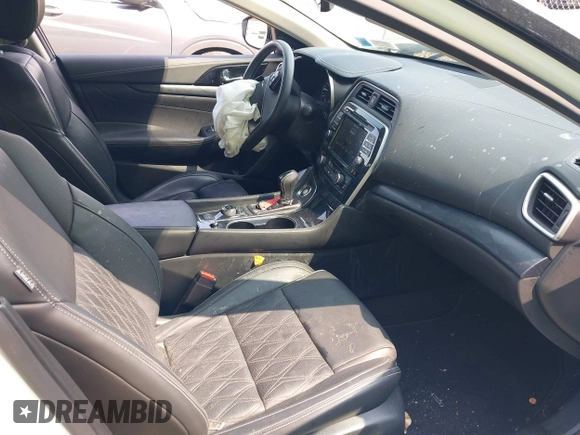 2023 Nissan Maxima Platinum with VIN 1N4AA6FV5PC505862, listed as a IAAI auction lot 42418625 with 10,485 mi miles and . Bid and sale history available at DreamBid. Image 5.