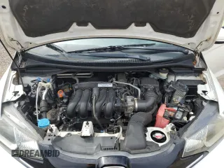 2015 Honda Fit EX-L with VIN 3HGGK5H80FM717893, listed as a Copart auction lot 58069985 with 140,926 mi miles and Clean title. Bid and sale history available at DreamBid. Image 11.