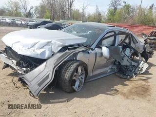 2016 Audi A8 Sport z VIN WAU43AFD0GN011518, wystawiony jako IAAI lot #42096343 z przebiegiem Nie podano mil oraz . Historia ofert i sprzedaży dostępna na DreamBid. Obrazek 17.