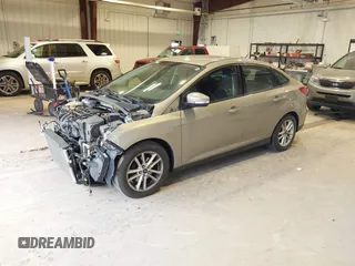 2016 Ford Focus SE z VIN 1FADP3F23GL277537, wystawiony jako IAAI lot #41603658 z przebiegiem 107 115 mil mil oraz . Historia ofert i sprzedaży dostępna na DreamBid. Obrazek 2.
