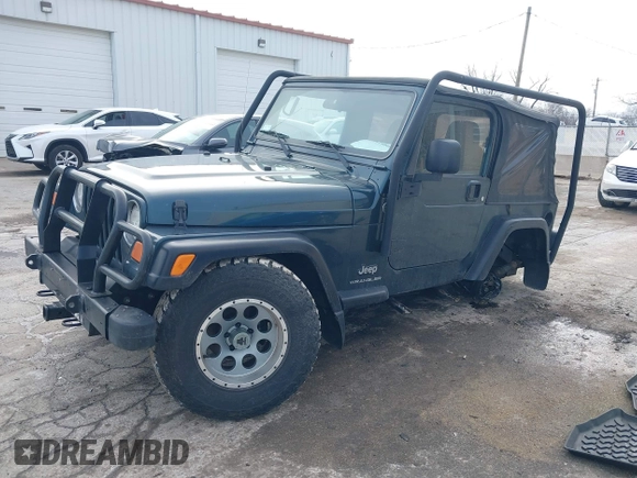 2005 Jeep Wrangler SE with VIN 1J4FA29S45P333916, listed as a IAAI auction lot 41214841 with 90,577 mi miles. Bid and sale history available at carsss.com. Image 17.