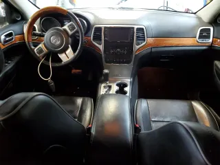 2013 Jeep Grand Cherokee Overland with VIN 1C4RJFCG2DC622345, listed as a Copart auction lot 49640325 with 192,144 mi miles and Salvage Title. Bid and sale history available at carsss.com. Image 8.